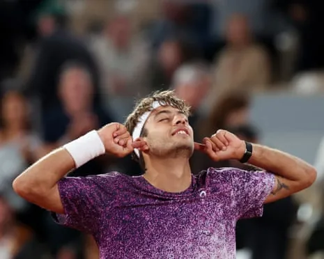 Flavio Cobolli celebrates after reaching his first grand slam semi-final.